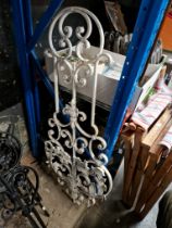 A large wrought iron decorative panel.