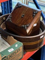 A brass bound wooden planter made from a section of a barrel by Lister & Co and a desk tidy/letter