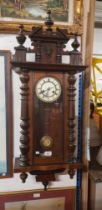 A Vienna wall clock, the enamelled dial marked with crossed arrows for The Hamburg American Clock