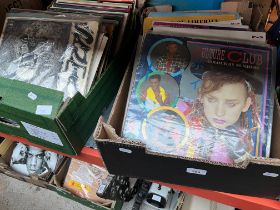 Two boxes of vinyl records, rock & pop including Santana, Elvis, Boogie Fever, The Beegees,