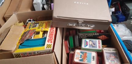 2 boxes of vintage toys, puzzles and boards games to include blue peter, racing car game, puppet,