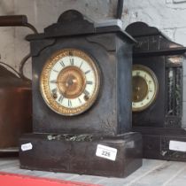 Two black slate mantle clocks.