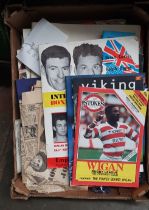 A box of sporting memorabilia including Open Golf programme, German football club pennant, boxing