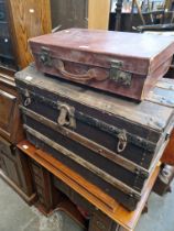 Vintage luggage comprising a domed trunk and three cases.