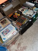 Four boxes of books (total), various genres including true crime, children's books, astronomy,