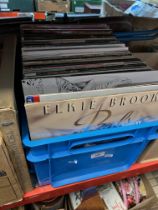 A box of assorted LP records