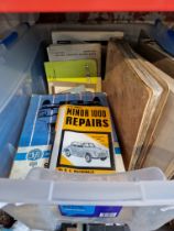A box of vintage motor workshop repair manuals
