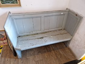 A 19th century painted church pew, width 132cm.