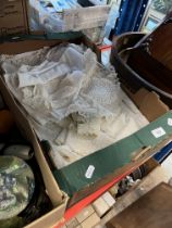 A box of linen and lace etc
