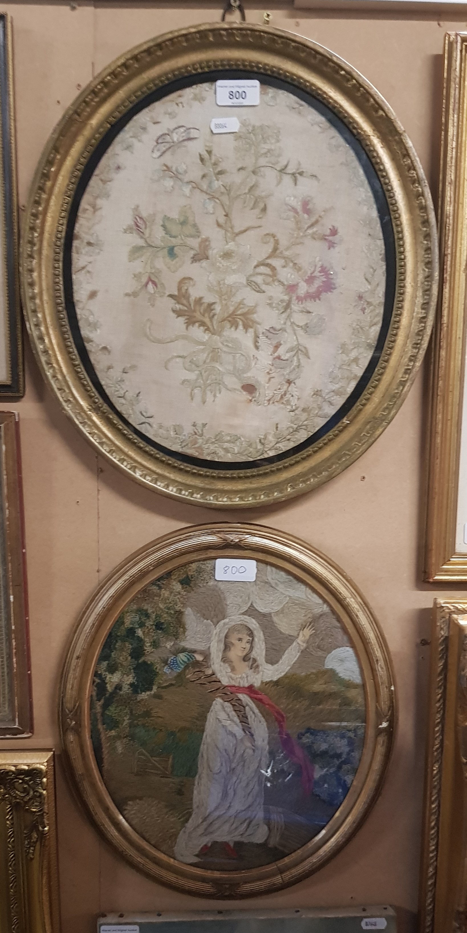 Two antique needlework pictures, each framed and glazed.