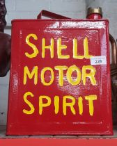 A Vintage Shell oil jerry can with brass cap.
