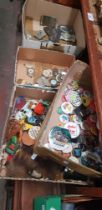 3 boxes of badges and medals and a box of metal belt buckles etc and a box of collectables including