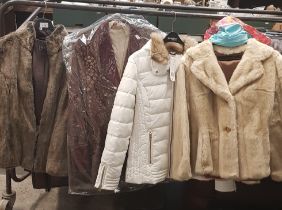 A faux fur jacket, fur stole, smokers jacket, ladies F&F padded jacket and a mink jacket