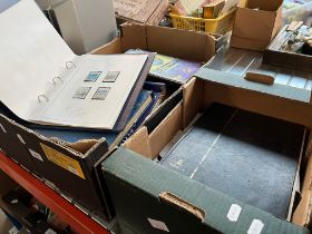 2 boxes of stamp albums