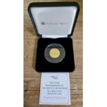 A Jubilee Mint 'THE 75TH ANNIVERSARY OF THE BATTLE OF BRITAIN 22-CARAT GOLD PROOF £1 COIN',