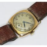 A 9ct gold cased mechanical wristwatch, case width 27mm, leather strap.