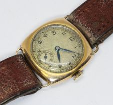 A 9ct gold cased mechanical wristwatch, case width 27mm, leather strap.