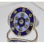 A Georgian blue enamel and diamond ring, the oval measuring approx. 20mm x 17mm and set with fifteen