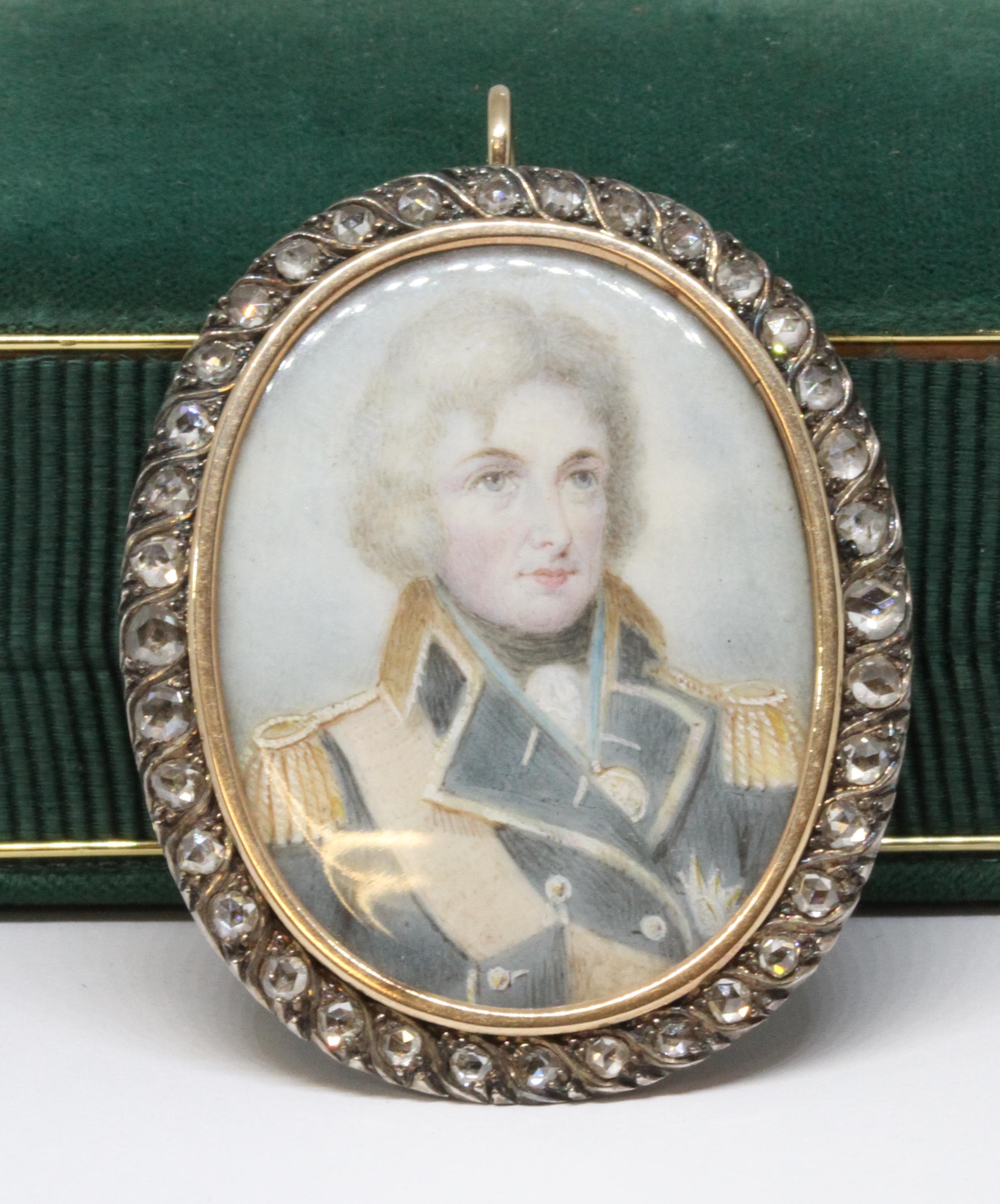 A late 18th century portrait miniature on ivory, circa 1790, depicting Lord Nelson, surrounded by
