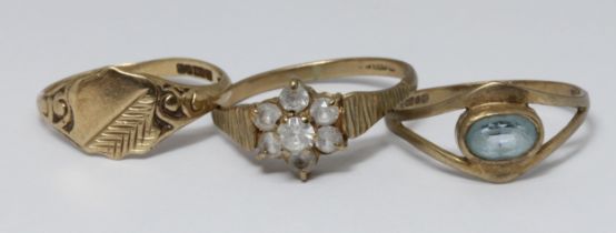A group of three hallmarked 9ct gold rings, gross weight 5g.