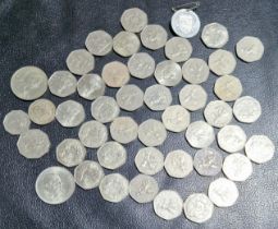 A group of assorted coins to include 50ps, commemorative crowns & a Preston Guild 1952 comm......