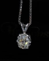 A diamond solitaire pendant, the six claw set old oval cushion cut stone weighing approx. 1.53cts,