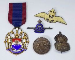 Assorted badges and medals comprising a bone and horn winged brooch 'Mother' the reverse