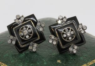 A pair of black onyx and diamond cluster earrings, yellow and white metal unmarked, gross wt. 4.