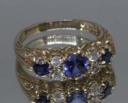 A hallmarked 9ct gold ring set with blue and white stones, gross weight 3.6g, size Q.
