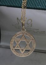 A hallmarked 9ct gold Star of David pendant on 57cm chain indistinctly marked, gross weight 5g.