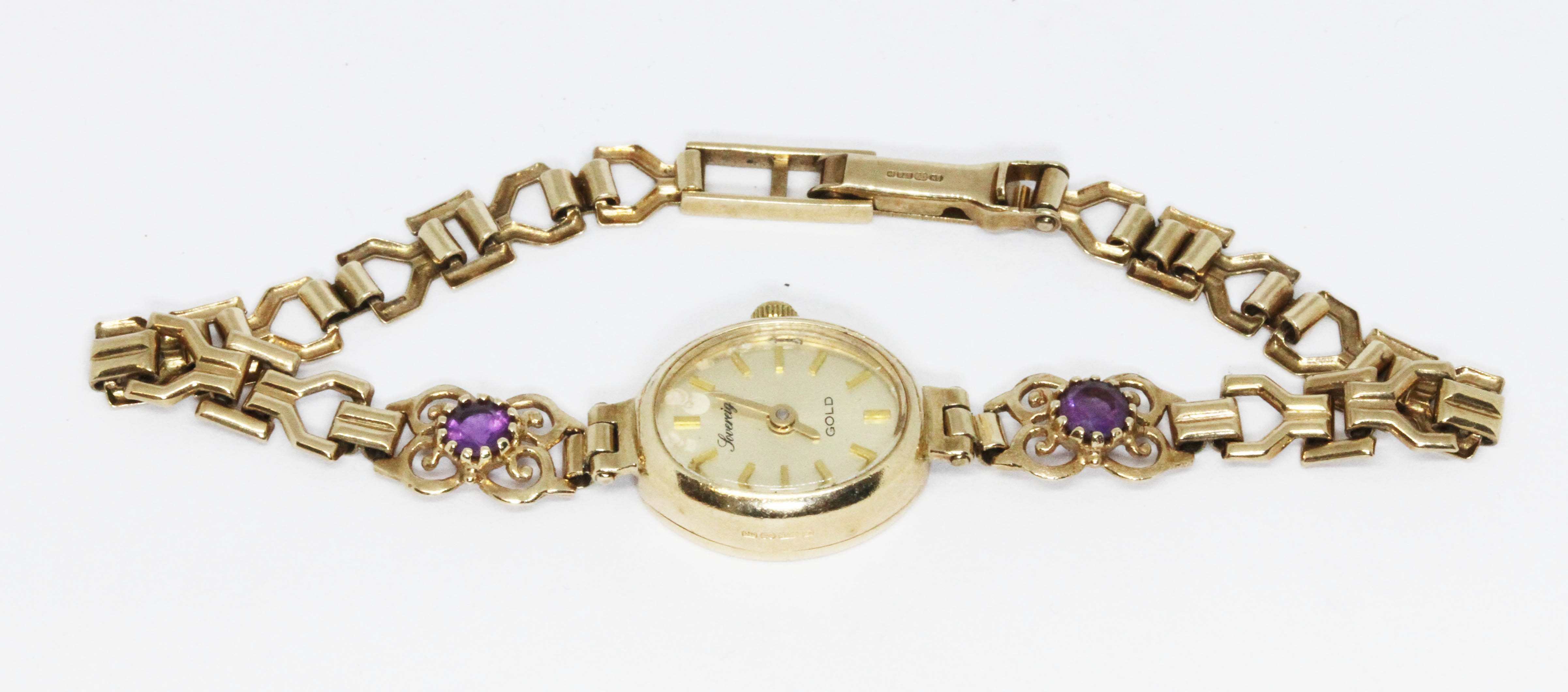 A hallmarked 9ct gold Sovereign wristwatch, gross weight 9.8g.