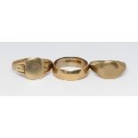 Two hallmarked 9ct gold rings and another unmarked,, gross weight 9.6g. Condition - both signet