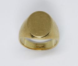An 18ct gold signet ring, sponsor 'DOM', weight 9.8g, size I/J.