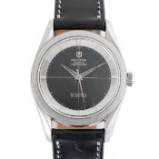 A GENTLEMAN'S SIZE STAINLESS STEEL UNIVERSAL GENEVE POLEROUTER WRIST WATCH CIRCA 1960 WITH BLACK