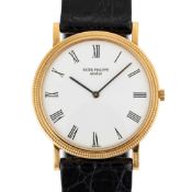 A GENTLEMAN'S SIZE 18K SOLID GOLD PATEK PHILIPPE CALATRAVA WRIST WATCH CIRCA 1980s, REF. 3520D