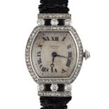 A FINE LADIES PLATINUM & 18K SOLID GOLD DIAMOND CARTIER TORTUE WRIST WATCH CIRCA 1930s Movement: