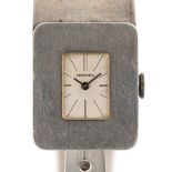 A VERY RARE SOLID SILVER HERMES BRACELET WATCH CIRCA 1970s, MADE BY JAEGER Movement: Manual wind,