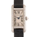 A LADIES 18K SOLID WHITE GOLD & DIAMOND CARTIER TANK MINI ALLONGEE WRIST WATCH DATED 2003, REF. 2525