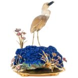 AN 18K SOLID GOLD, SOLID SILVER GILT & ROCK CRYSTAL ORNAMENT DEPICTING A STORK STANDING ON A ROCK