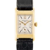 A GENTLEMAN'S SIZE 18K SOLID YELLOW GOLD PATEK PHILIPPE RECTANGULAR WRIST WATCH CIRCA 1940s, REF.