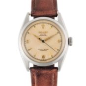 A GENTLEMAN'S SIZE STAINLESS STEEL ROLEX OYSTER PERPETUAL "SEMI BUBBLE BACK" WRIST WATCH CIRCA 1952,