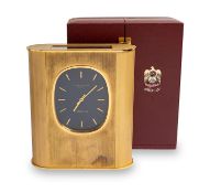 AN EXTREMELY RARE GILDED BRASS PATEK PHILIPPE ELLIPSE SOLAR DESK CLOCK CIRCA 1978, COMMISSIONED ON