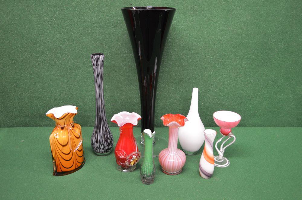 Group of eight glass vases of varying forms and a tea light stand Please note descriptions are not