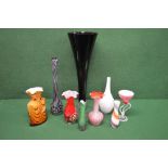 Group of eight glass vases of varying forms and a tea light stand Please note descriptions are not