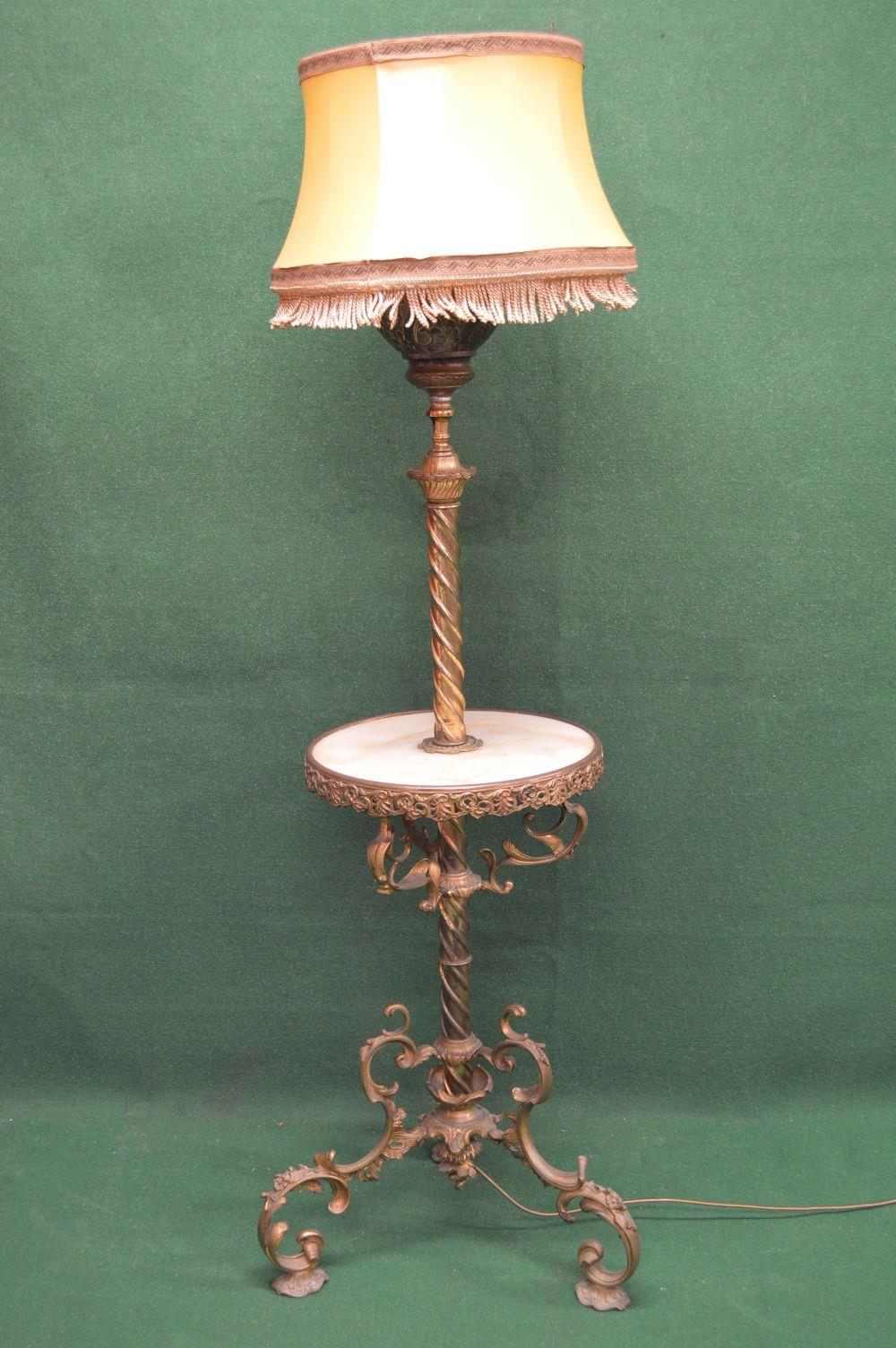 Victorian brass oil standard lamp table having later electric conversion, the embossed font