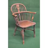 19th century elm comb back Windsor chair having pierced back splat and spindles over solid seat,