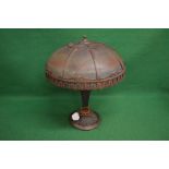 Bronzed table lamp the shade having sectional glass panels decorated with river, trees and