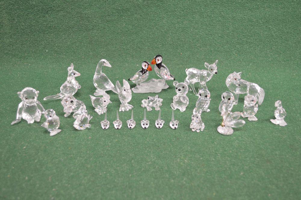 Group of twenty five Swarovski crystal figures of animals to include: puffins, frog, birds,