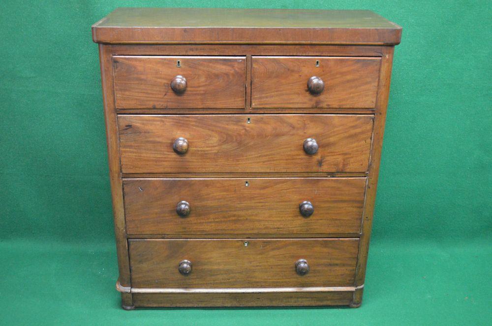 Victorian mahogany chest of drawers the top having rounded corners over two short and three long