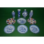 Group of Oriental china to include: blue and white moon flask, vase and two urns and six plates
